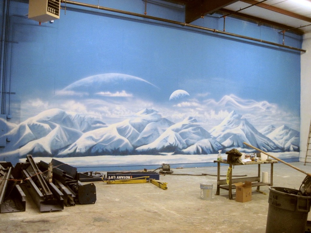 Snowy mountain mural for car dealership in Atlanta by Paul Barker of Googleplex