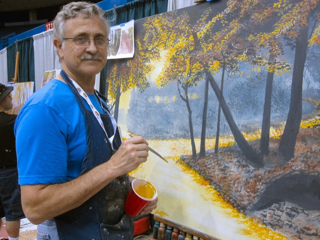 Muralist Paul Barker painting his winning entry in the Great American Muralist Competition Tucson Arizona 2011